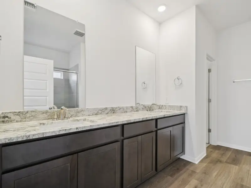 Furnished interior view inside a new home in Riverbend at Double Eagle - Boulevard Collection, Cedar Creek (Image 3).