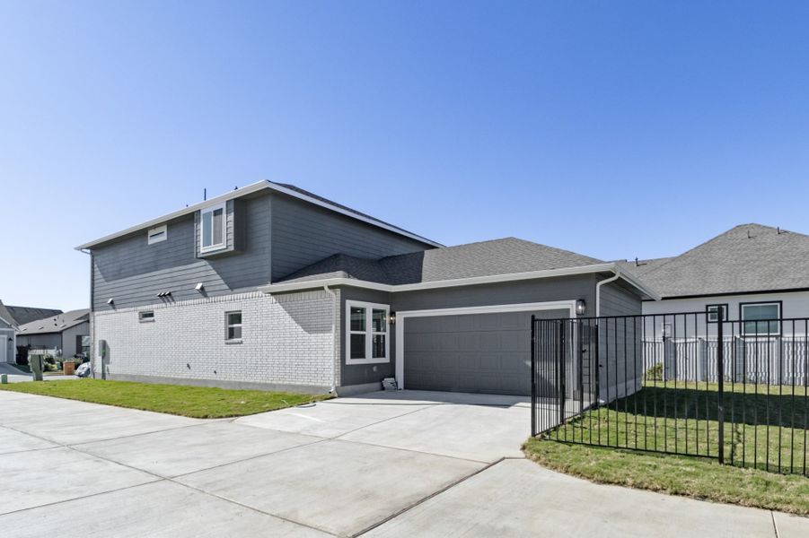 Front exterior of a new home in Easton Park, Austin, TX, highlighting curb appeal (Image 32).
