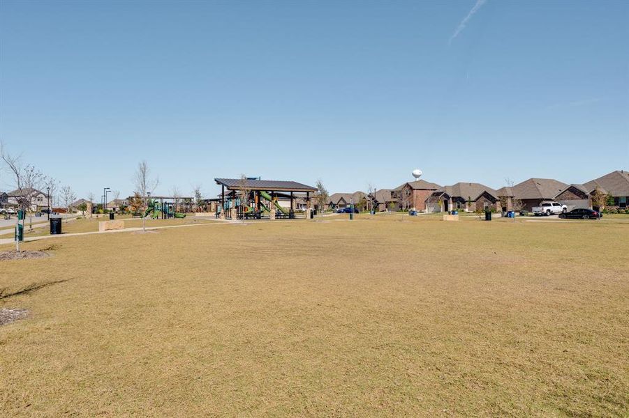 Surrounding community with a residential view and a yard Surrounding community with a residential view and a yard