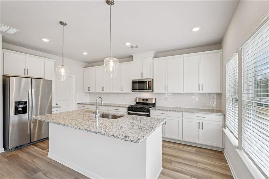 Furnished interior view inside a new home in Harmony Manor, Fairburn (Image 13).