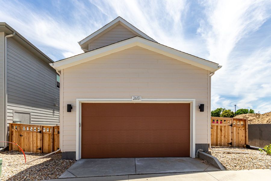 Front exterior of a new home in Arras Park, Thornton, CO, highlighting curb appeal (Image 28).