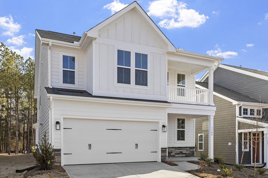Front exterior of a new home in Sweetbrier, Durham, NC, highlighting curb appeal (Image 21).