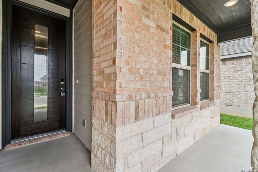 Exterior details and patio area of a home in Kallison Ranch, San Antonio (Image 27).