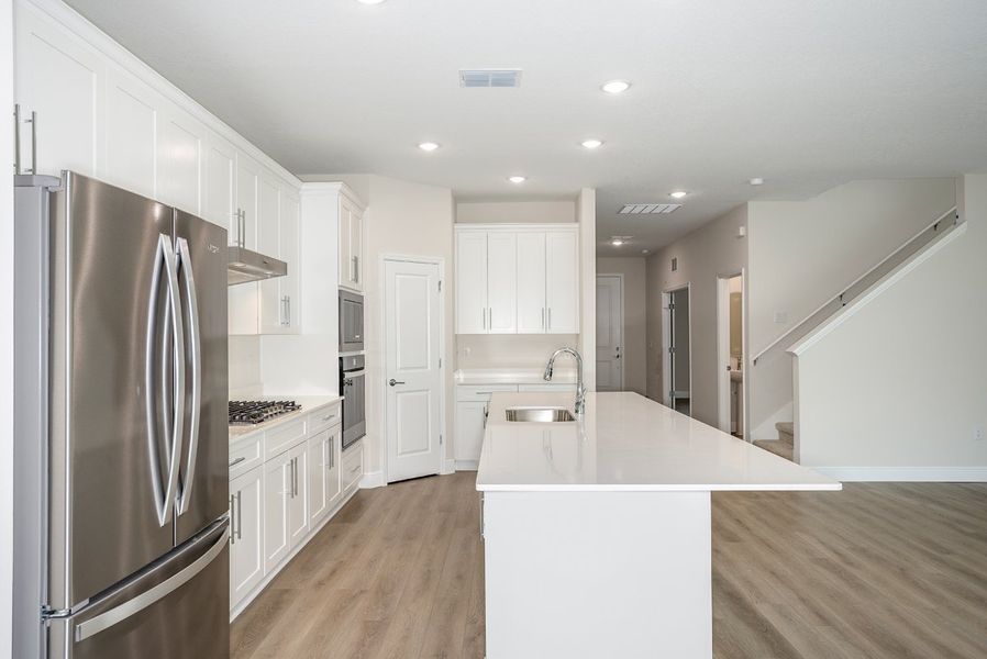 Furnished interior view inside a new home in Pasadena Woods, Dade City (Image 5).