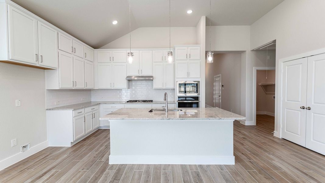 Furnished interior view inside a new home in Sunterra, Katy (Image 6).