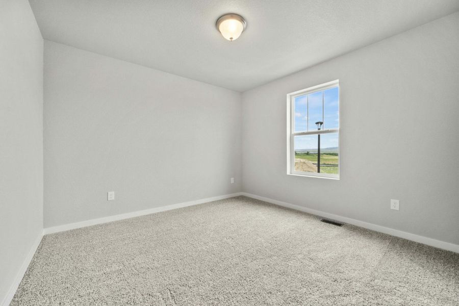 Representative unfurnished interior of a home built from the Balsam by View Homes in Aspen Ranch, Fountain (Image 27).
