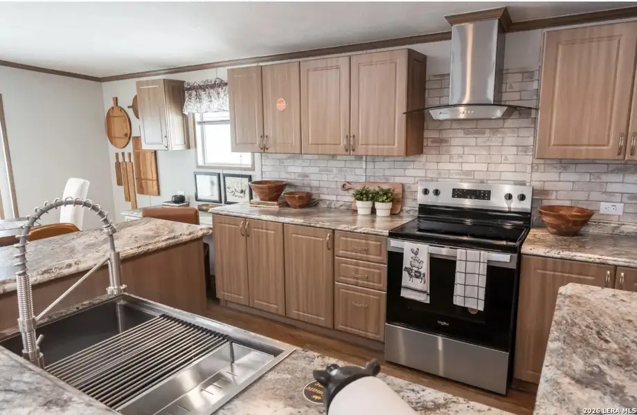 Furnished interior view inside a new home in , Elmendorf (Image 4).