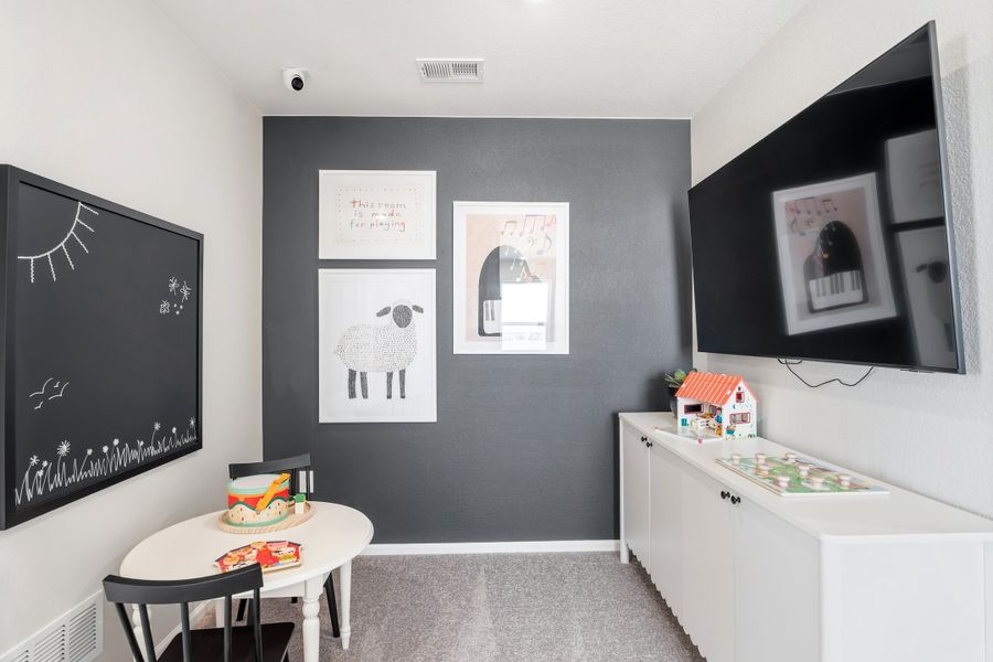 Representative furnished interior of a home built from the 2003 by Risewell Homes in Harvest Crossing, Aurora (Image 11).