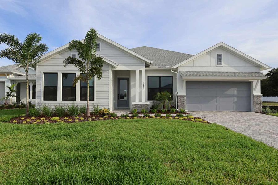 Representative exterior photo of a completed home built from the The Colston by David Weekley Homes in Lakeview Crossing – Classic Series, Sarasota, FL (Image 13).