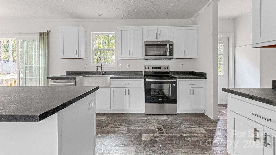 Furnished interior view inside a new home in , Statesville (Image 6).