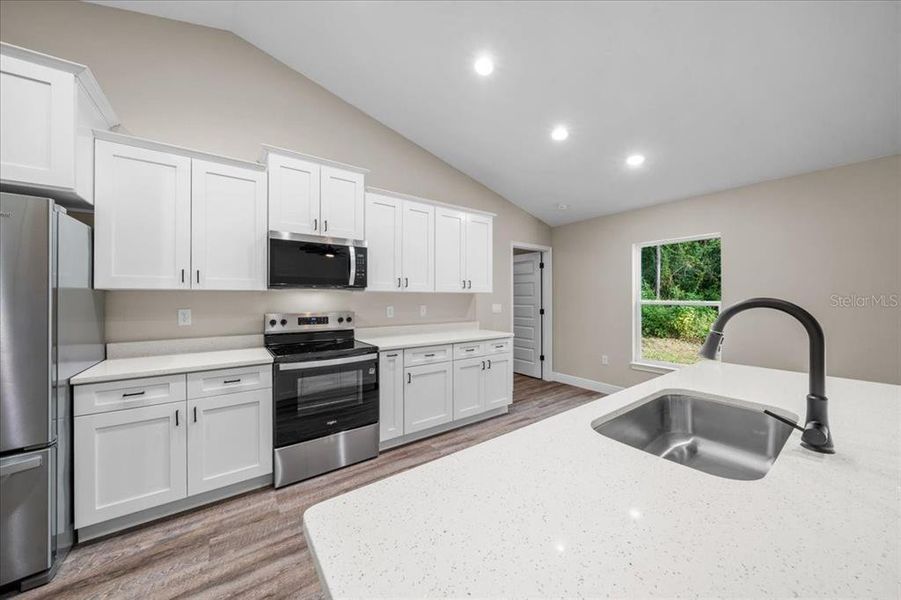 Furnished interior view inside a new home in , Dunnellon (Image 13).