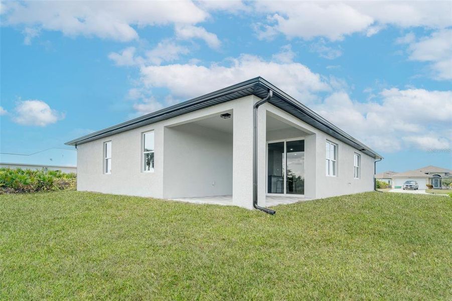 Exterior details and patio area of a home in , Rotonda West (Image 4).