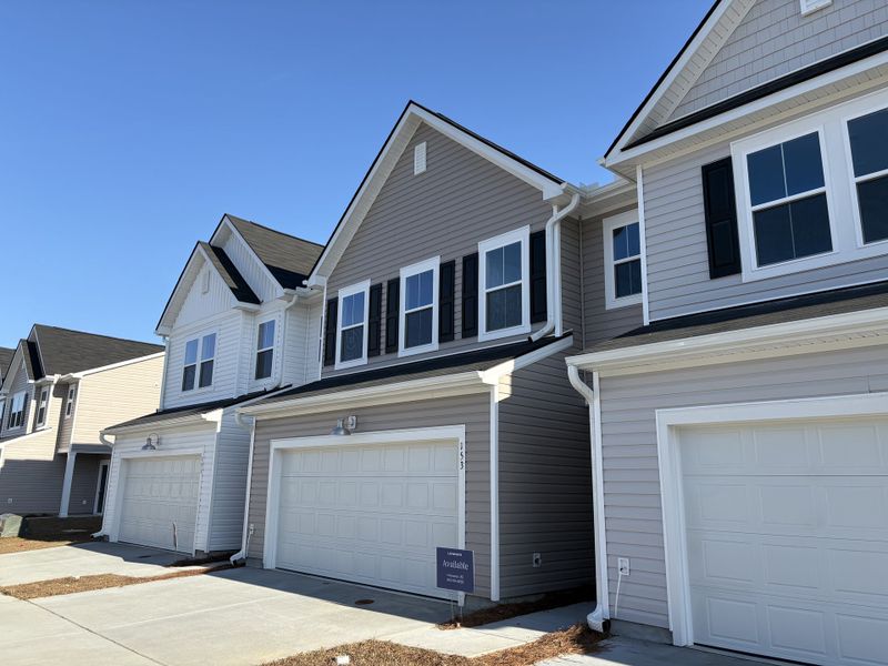 Front exterior of a new home in Dawson Pointe, Summerville, SC, highlighting curb appeal (Image 1). Front exterior of a new home in Dawson Pointe, Summerville, SC, highlighting curb appeal (Image 1).