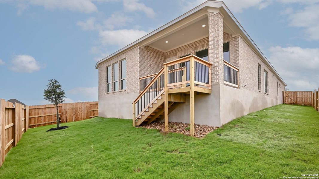Front exterior of a new home in Homestead 55', Cibolo, TX, highlighting curb appeal (Image 1).