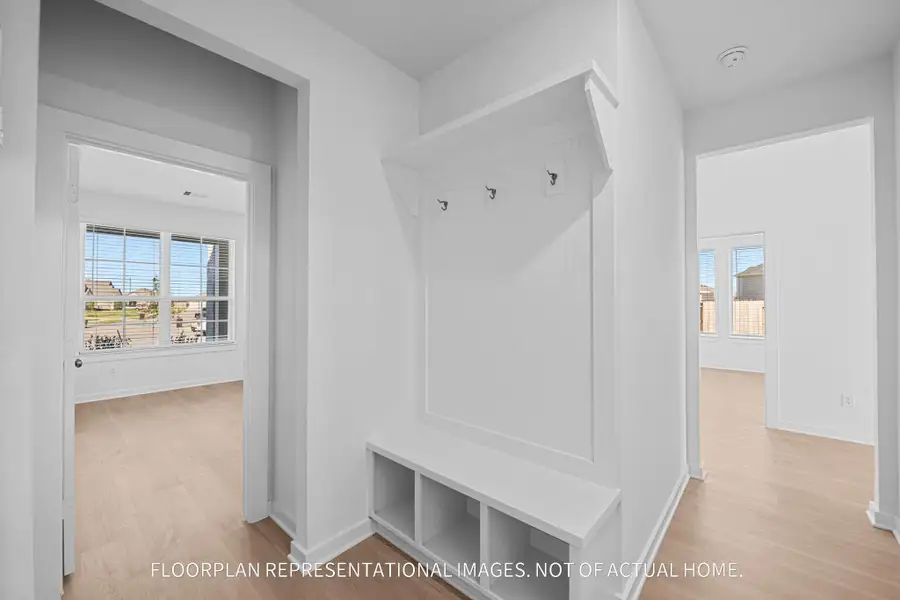 Spacious, unfurnished interior of a new home in The Oaks on 6th Street, Magnolia (Image 11).