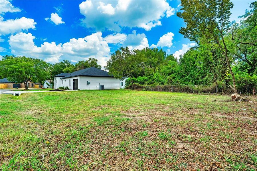 Front exterior of a new home in , Ennis, TX, highlighting curb appeal (Image 19). Front exterior of a new home in , Ennis, TX, highlighting curb appeal (Image 19).