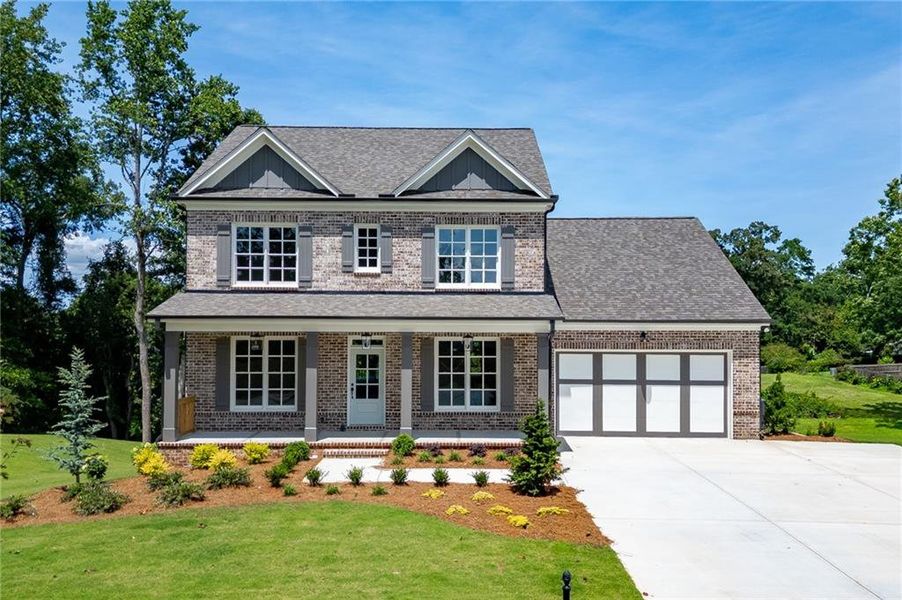 Front exterior of a new home in , Buford, GA, highlighting curb appeal (Image 27). Front exterior of a new home in , Buford, GA, highlighting curb appeal (Image 27).