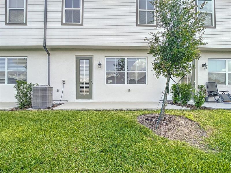 Front exterior of a home in the The Enclaves at Festival Cove community, located in Davenport, FL (Image 10).
