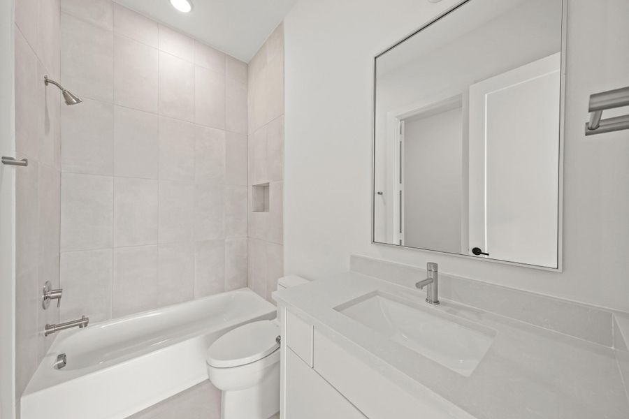 Furnished interior view inside a new home in Bridgeland, Cypress (Image 18).