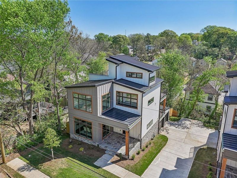 Front exterior of a new home in , Atlanta, GA, highlighting curb appeal (Image 26).