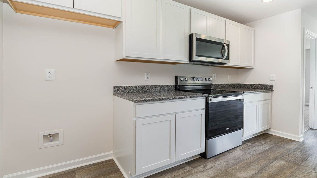 Representative furnished interior of a home built from the ARIA by D.R. Horton in Heritage Crossing, Conway (Image 6).