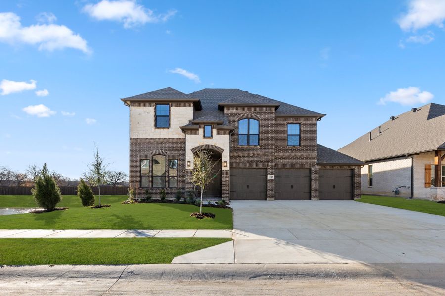 Representative exterior photo of a completed home built from the Fairview by Sandlin Homes in Lakesong, Midlothian, TX (Image 20). Representative exterior photo of a completed home built from the Fairview by Sandlin Homes in Lakesong, Midlothian, TX (Image 20).