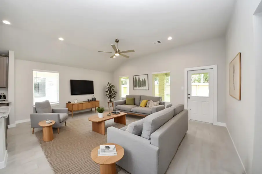 Virtually Staged - Family room. Sample photo of completed home with similar floor plan. Actual colors and selections may vary.