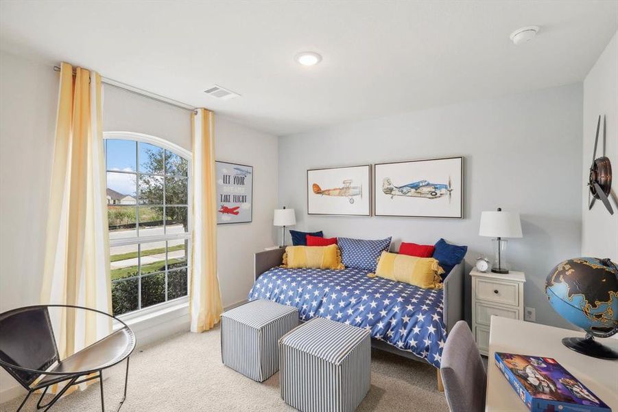 Bedroom featuring carpet flooring