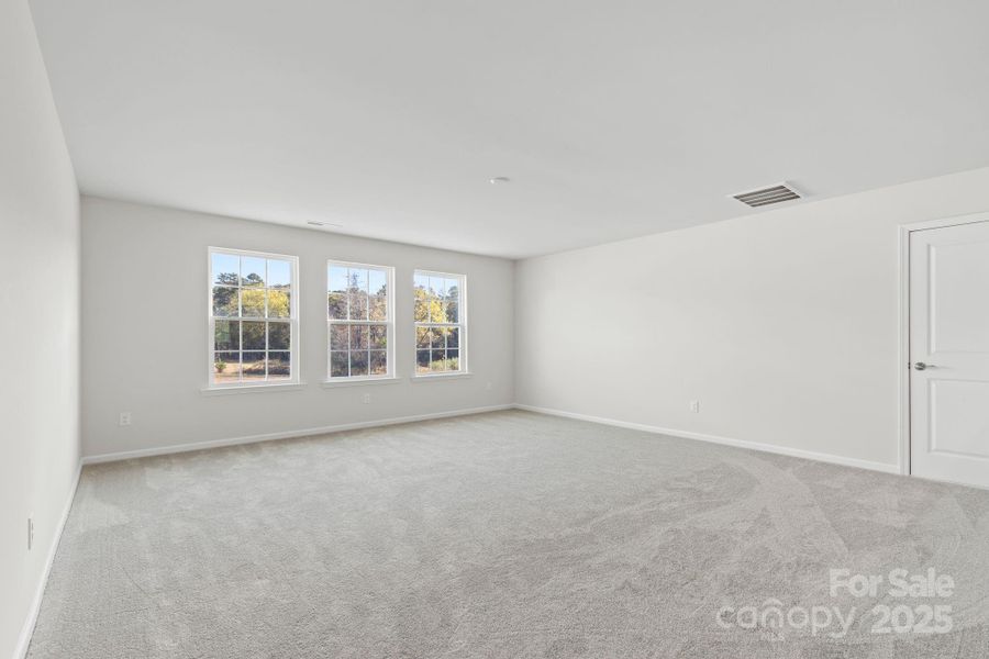 Spacious, unfurnished interior of a new home in Bell Farm: 60's, Statesville (Image 19).