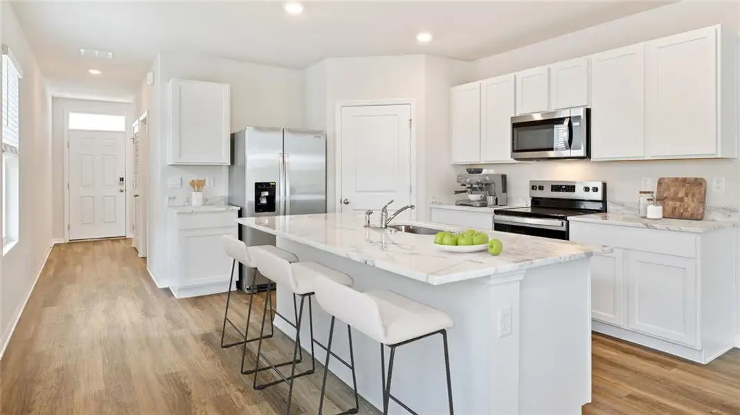Furnished interior view inside a new home in Seaire, Parrish (Image 11).