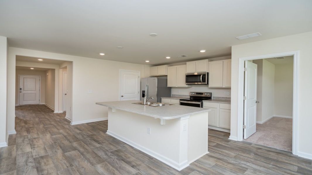 Representative furnished interior of a home built from the ARIA by D.R. Horton in Jordanville Farms, Galivants Ferry (Image 7).