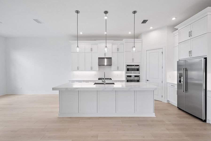 Furnished interior view inside a new home in L'Ambiance at Avenir, Palm Beach Gardens (Image 15).