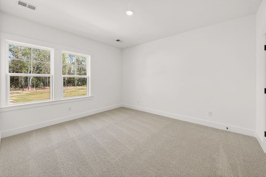 Spacious, unfurnished interior of a new home in Indigo Place, North Charleston (Image 24).