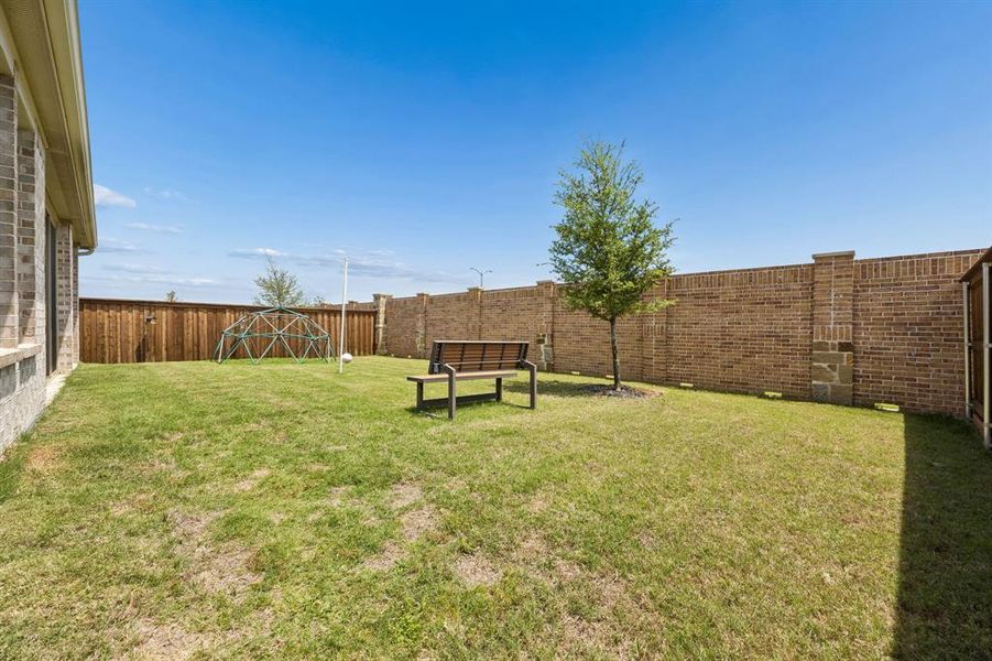 Exterior details and patio area of a home in , Little Elm (Image 21).