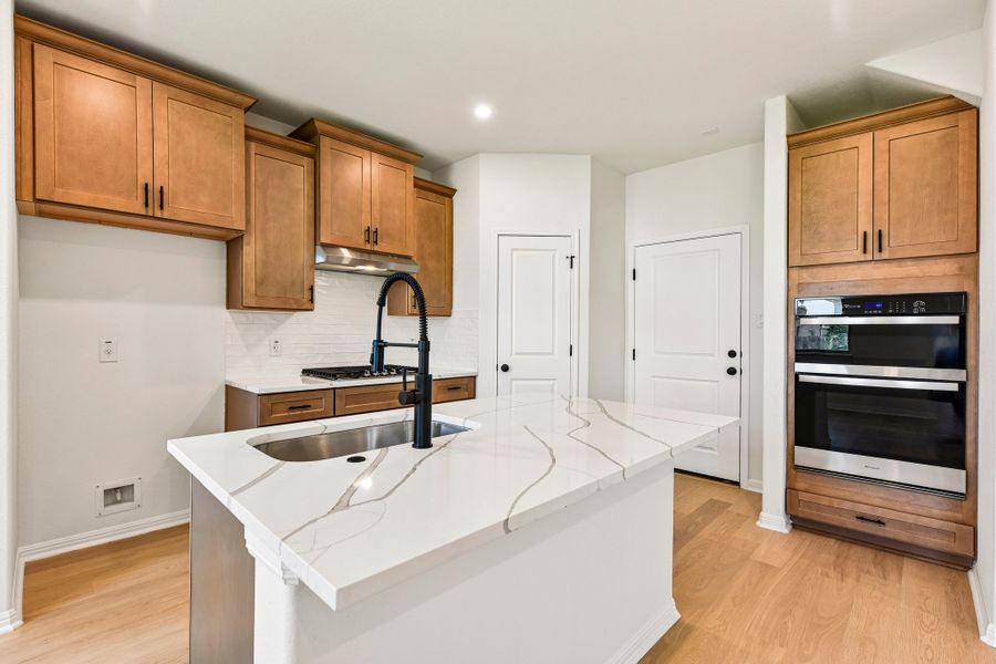 Furnished interior view inside a new home in Crosswinds, Kyle (Image 4).