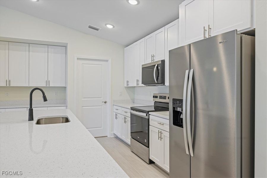 Furnished interior view inside a new home in Cape Coral, Cape Coral (Image 5).