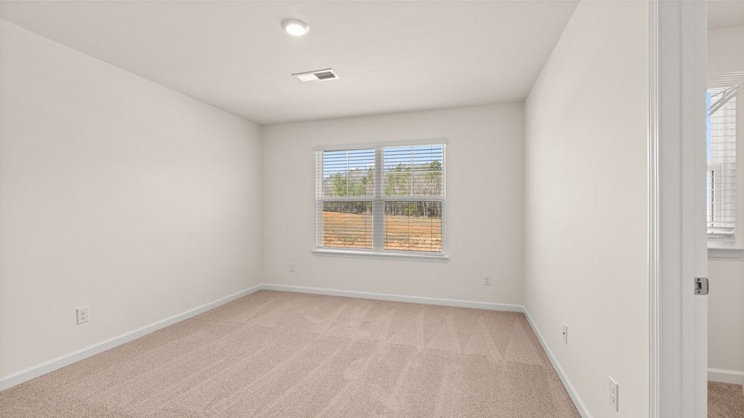Representative unfurnished interior of a home built from the Edison by D.R. Horton in Westland, Bogart (Image 37).