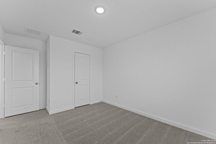Spacious, unfurnished interior of a new home in Voss Farms, New Braunfels (Image 28).
