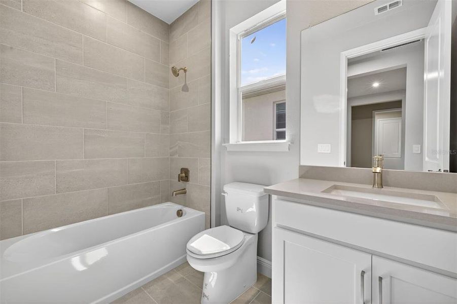 Furnished interior view inside a new home in Wellen Park, Venice (Image 7).