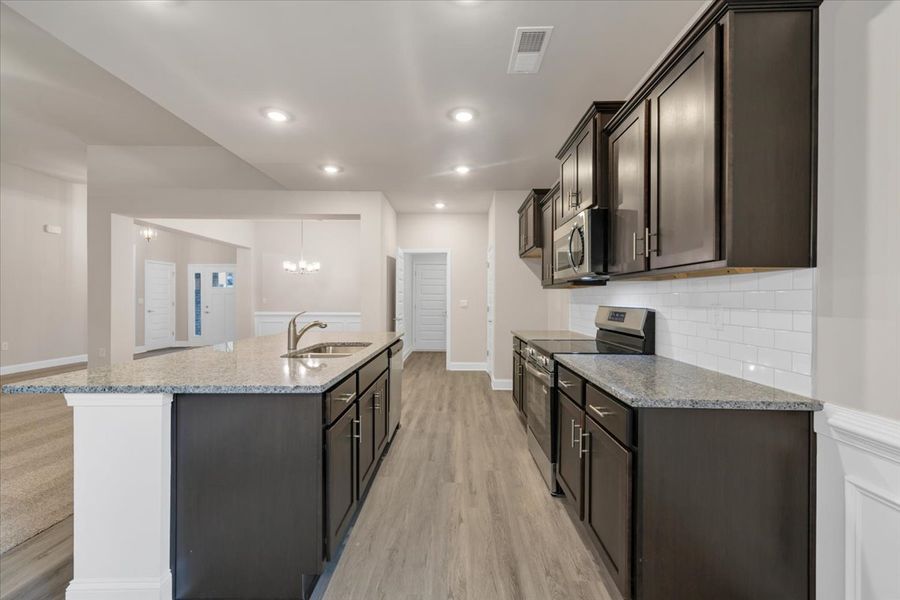Furnished interior view inside a new home in Scarlett Place, Bowdon (Image 9).