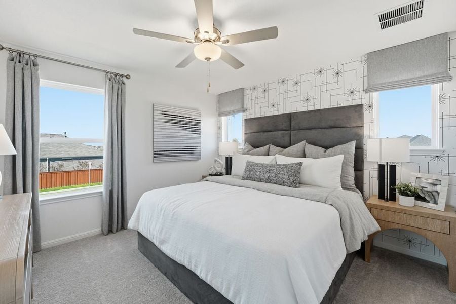 Representative furnished interior of a home built from the Harrier by Taylor Morrison in Longview 40s, Del Valle (Image 12).