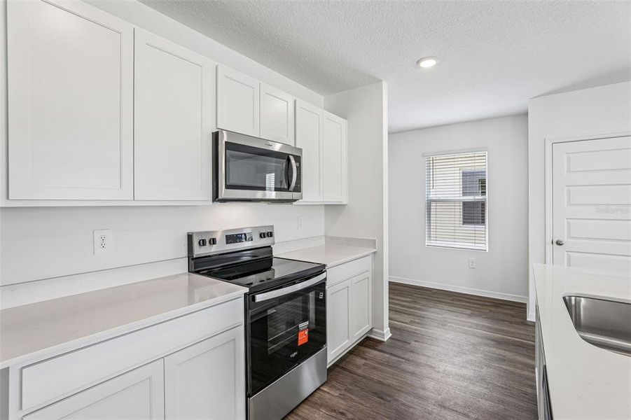 Furnished interior view inside a new home in Avalon Park Tavares, Tavares (Image 4).
