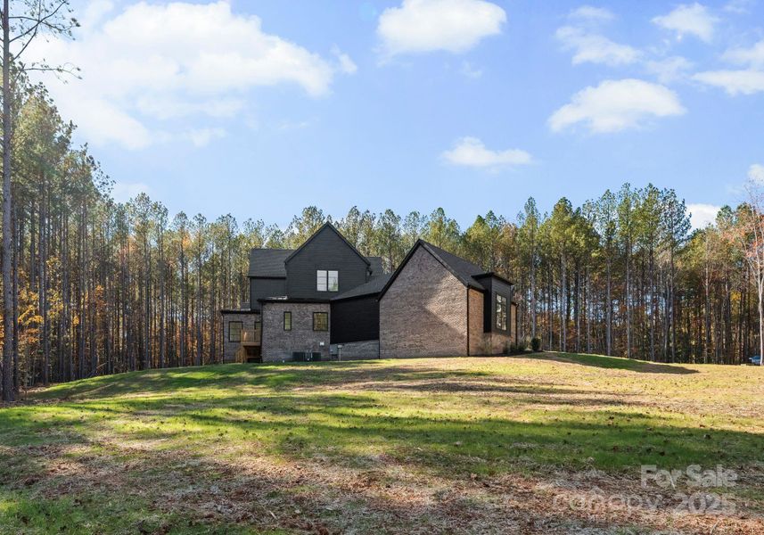 Front exterior of a new home in , Denver, NC, highlighting curb appeal (Image 2).