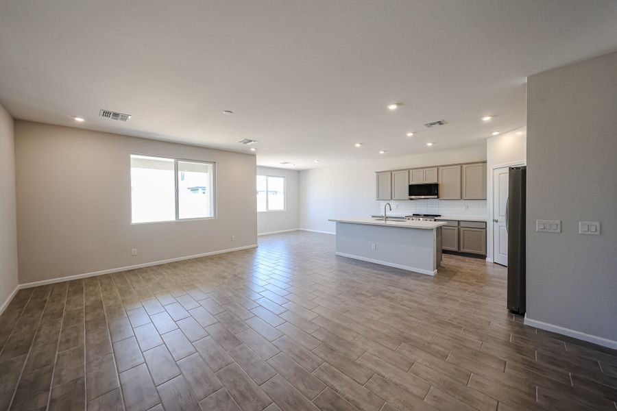 A large empty kitchen. A large empty kitchen.