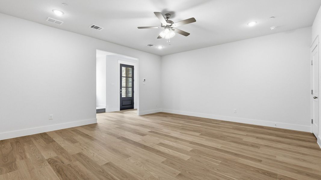 Furnished interior view inside a new home in Collin Creek, Plano (Image 12).