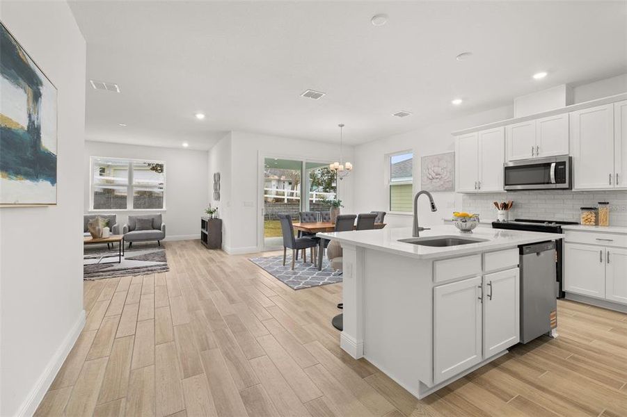 Furnished interior view inside a new home in Green Key Village, Lady Lake (Image 8).