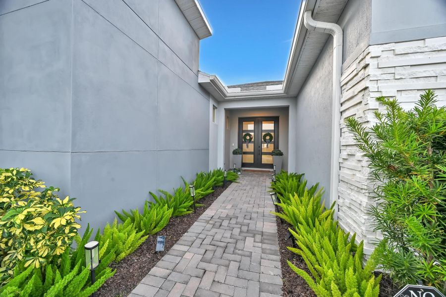 Exterior details and patio area of a home in Tradition - Cadence, Port St. Lucie (Image 28).