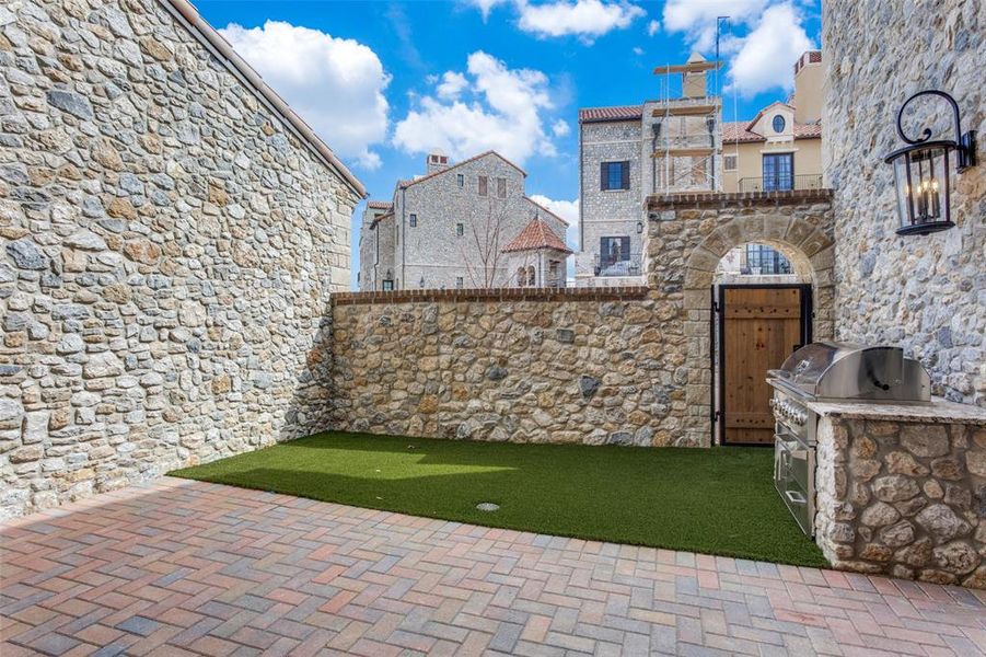 View of yard featuring exterior kitchen