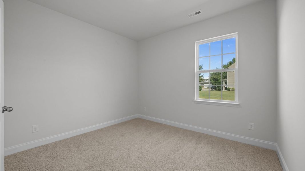 Spacious, unfurnished interior of a new home in Tyler - Home on the Lake, New Bern (Image 27).