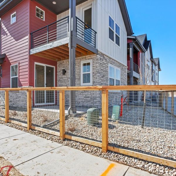 Front exterior of a new home in Arras Park, Thornton, CO, highlighting curb appeal (Image 2).
